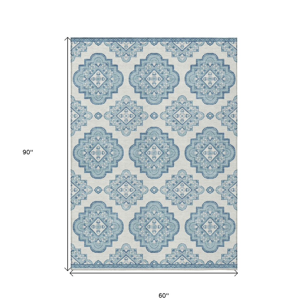 5' X 8' Teal Blue And Ivory Medallion Washable Indoor Outdoor Area Rug